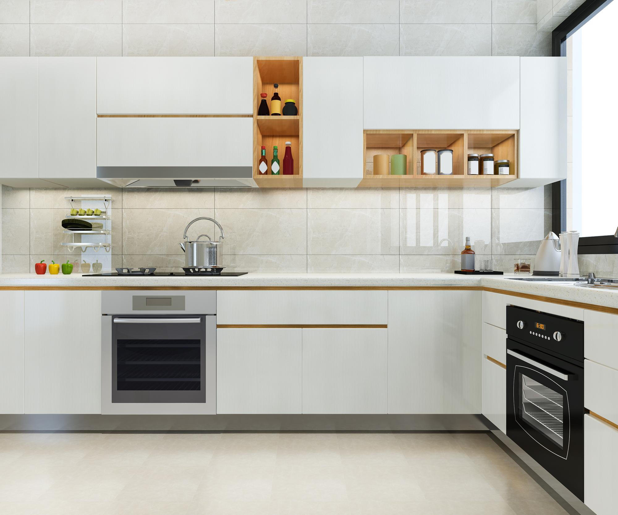 Modern white kitchen with built-in oven, stovetop pot, open shelves with condiments, and kettle by a large window.