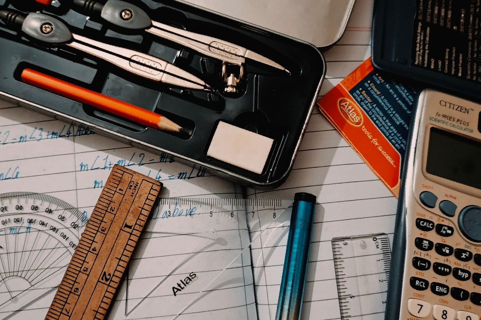 Geometry compass and ruler used for H2 Maths measurement and mathematical diagram practice