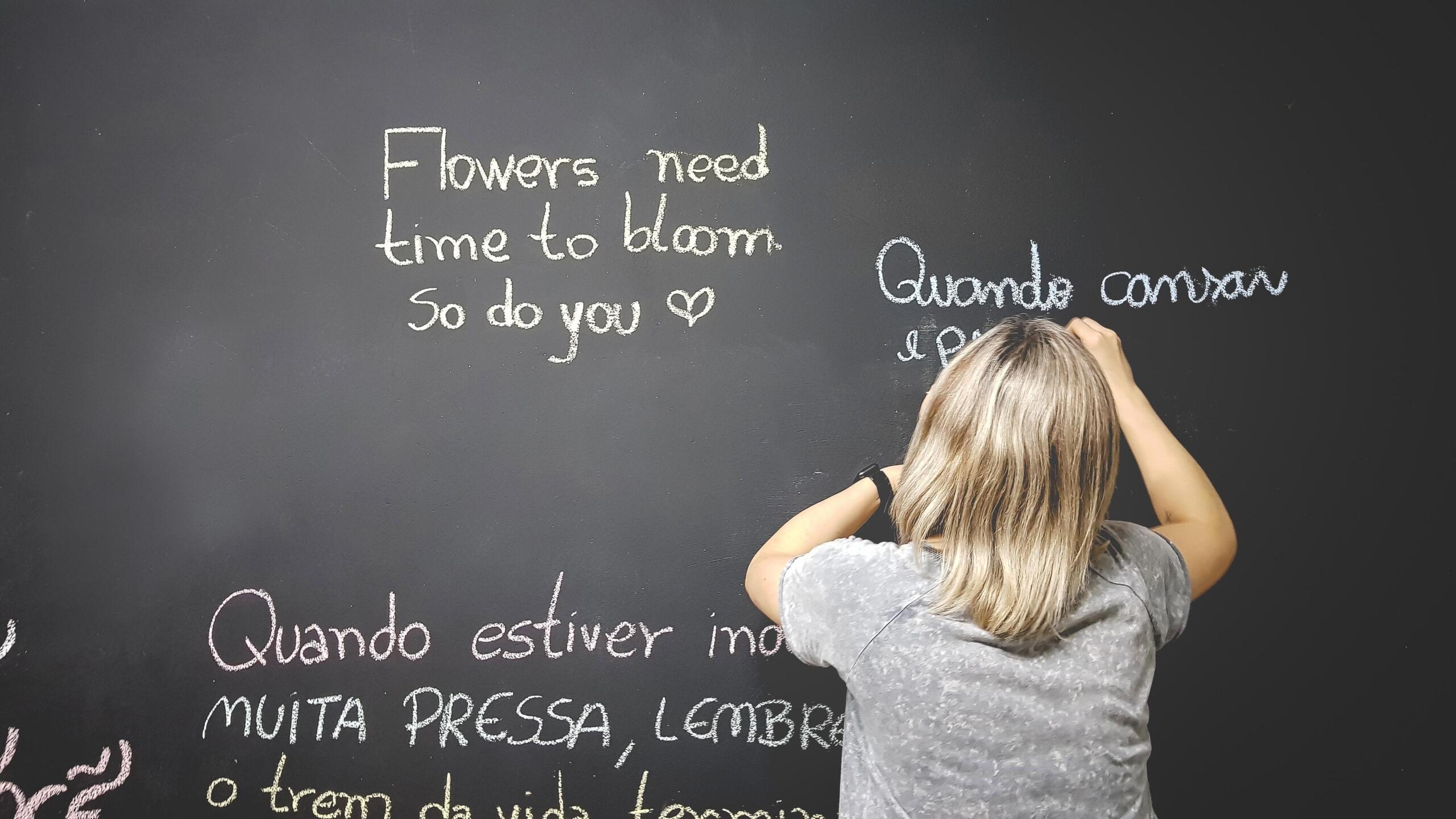 Writing in different languages on the chalkboard