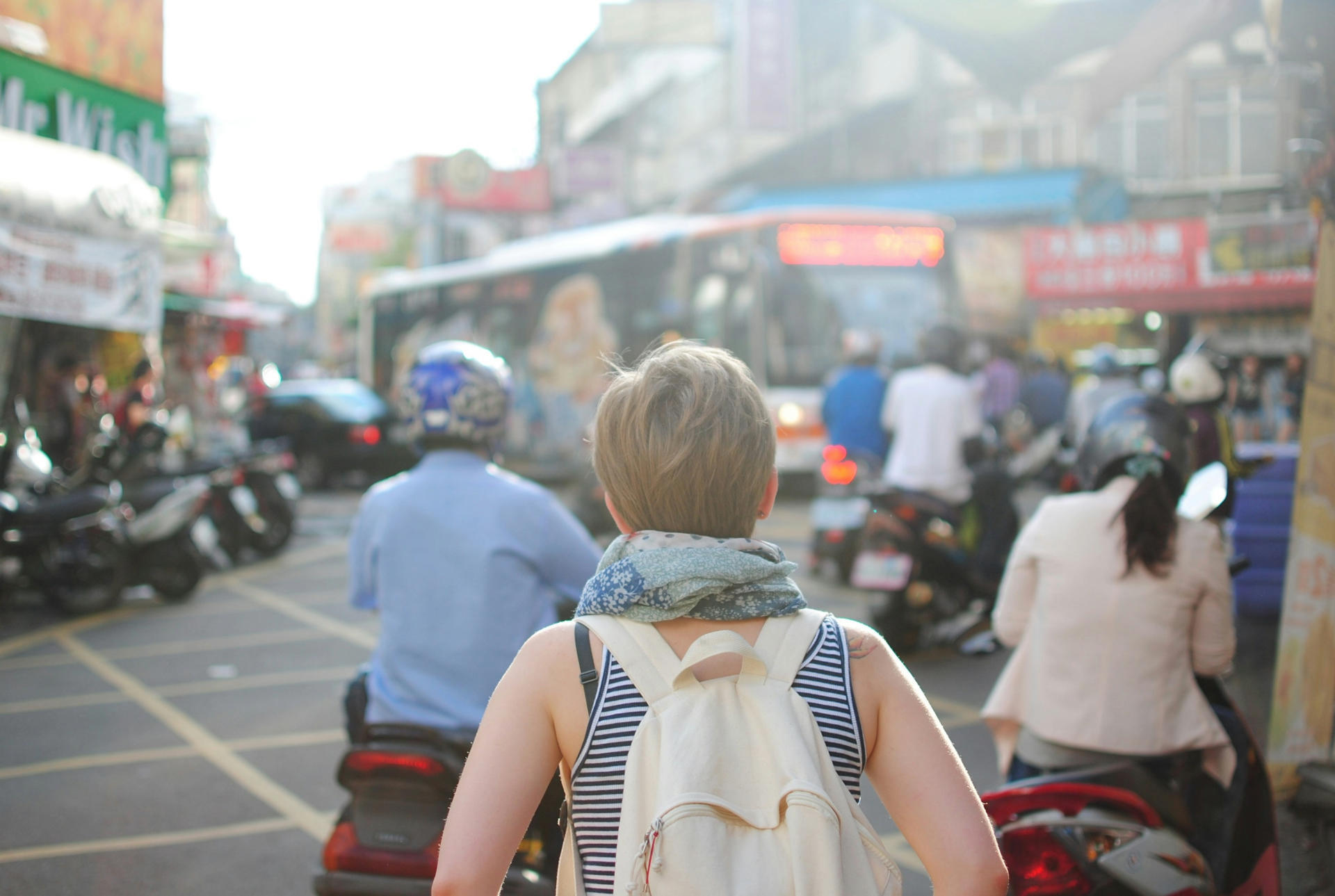 lady walking in a street in asia