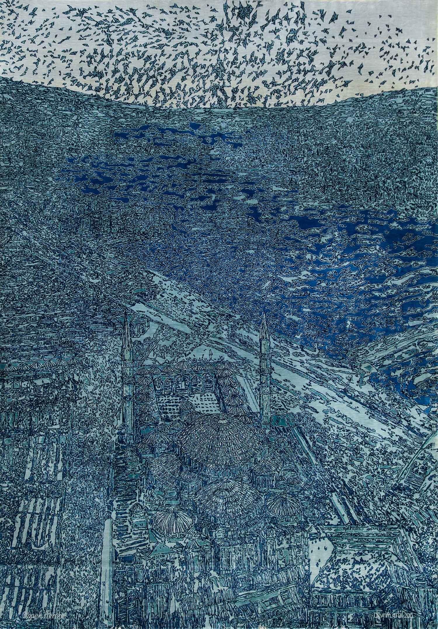 Devrim Erbil'in soyut ve çizgisel tarzını yansıtan, dikey tekstürlerin ve renk geçişlerinin hakim olduğu; mavi-beyaz tonların ritmik dağılımı ön plana çıkan iki modern el dokuma halı tasarımı.