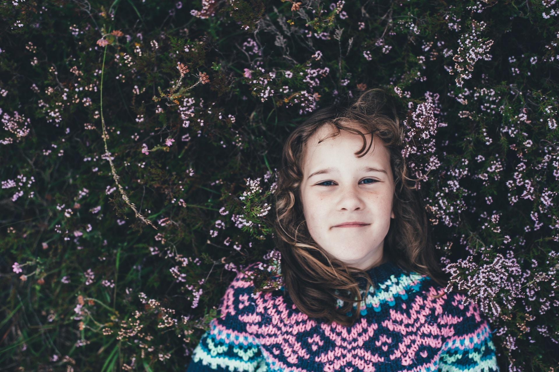 a little girl daydreaming