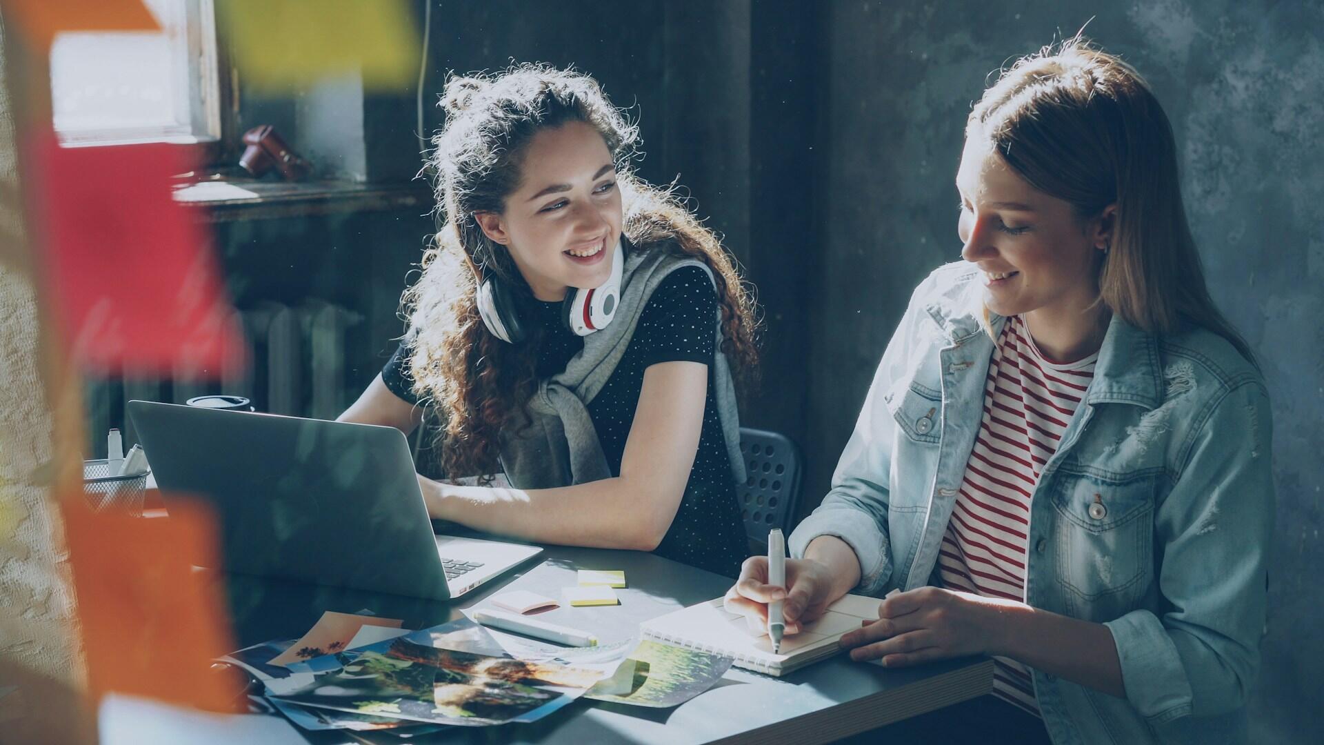 two girls talking to each other