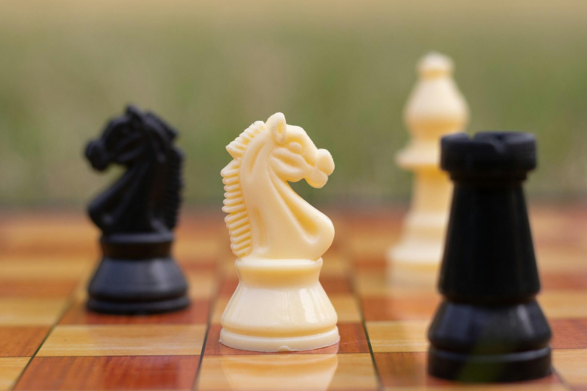 a chess board with chess figures on it