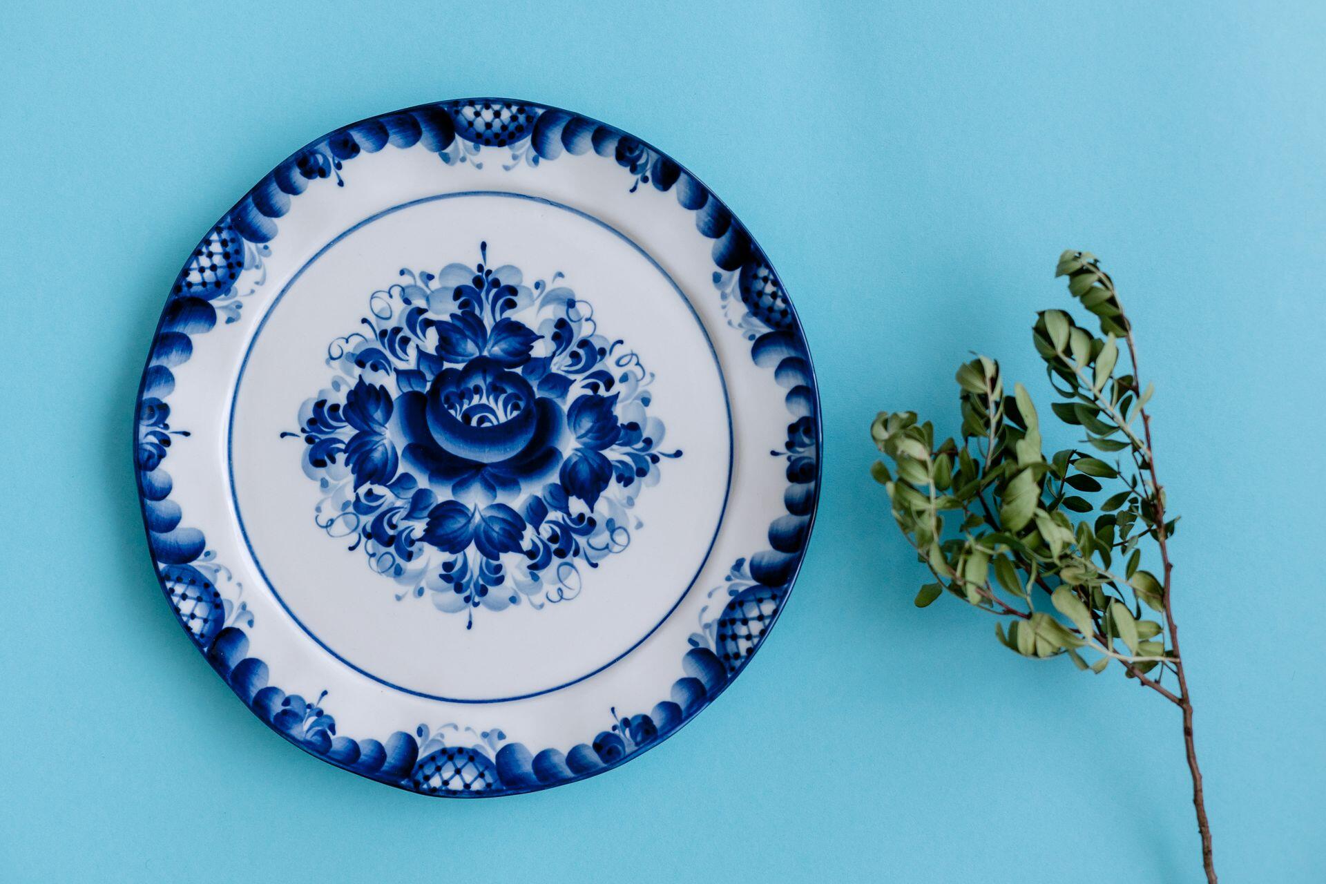 painted plate on the blue background