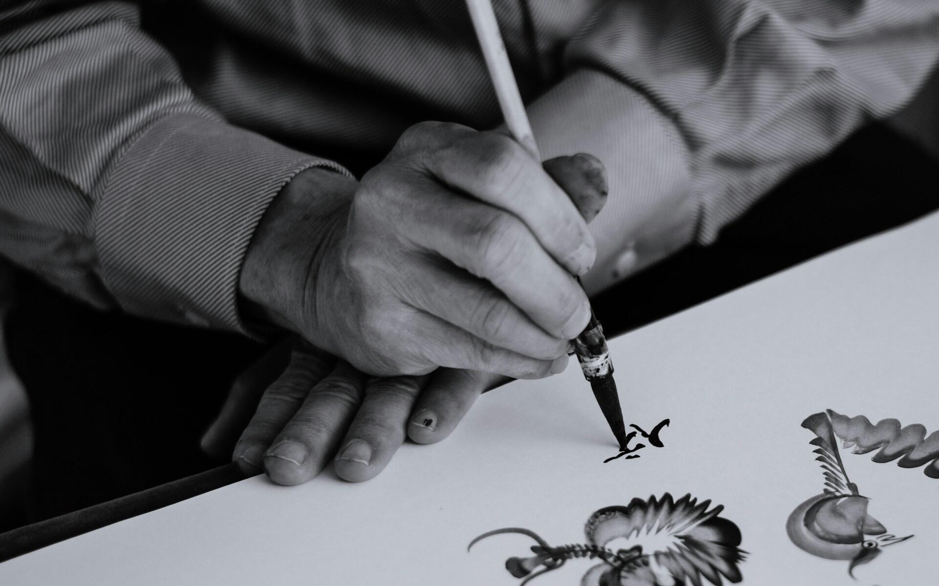 black and white picture of sketching process