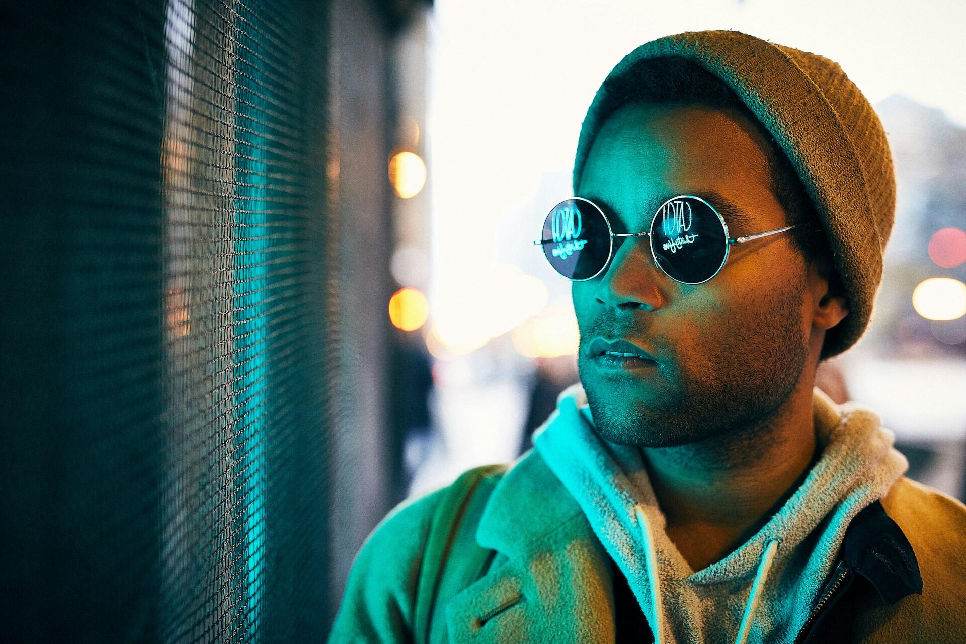 an afro-american man in glasses