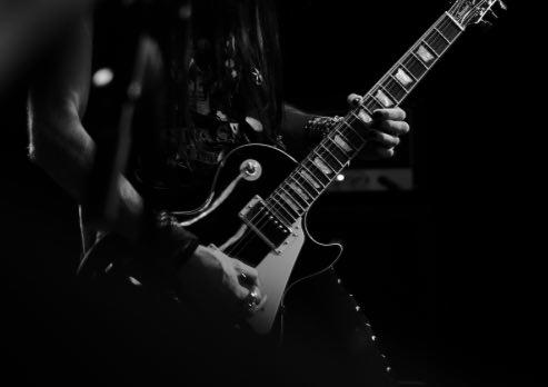 A man playing guitar