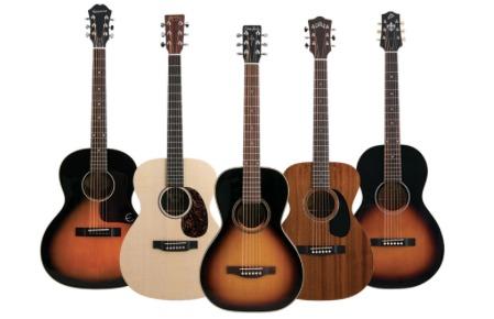 Some different shapes of acoustic guitars.