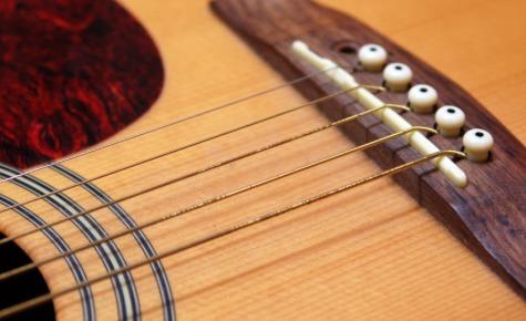 Dirty guitar strings on a classical guitar