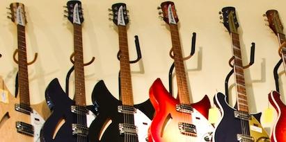 Guitars hung against the wall.