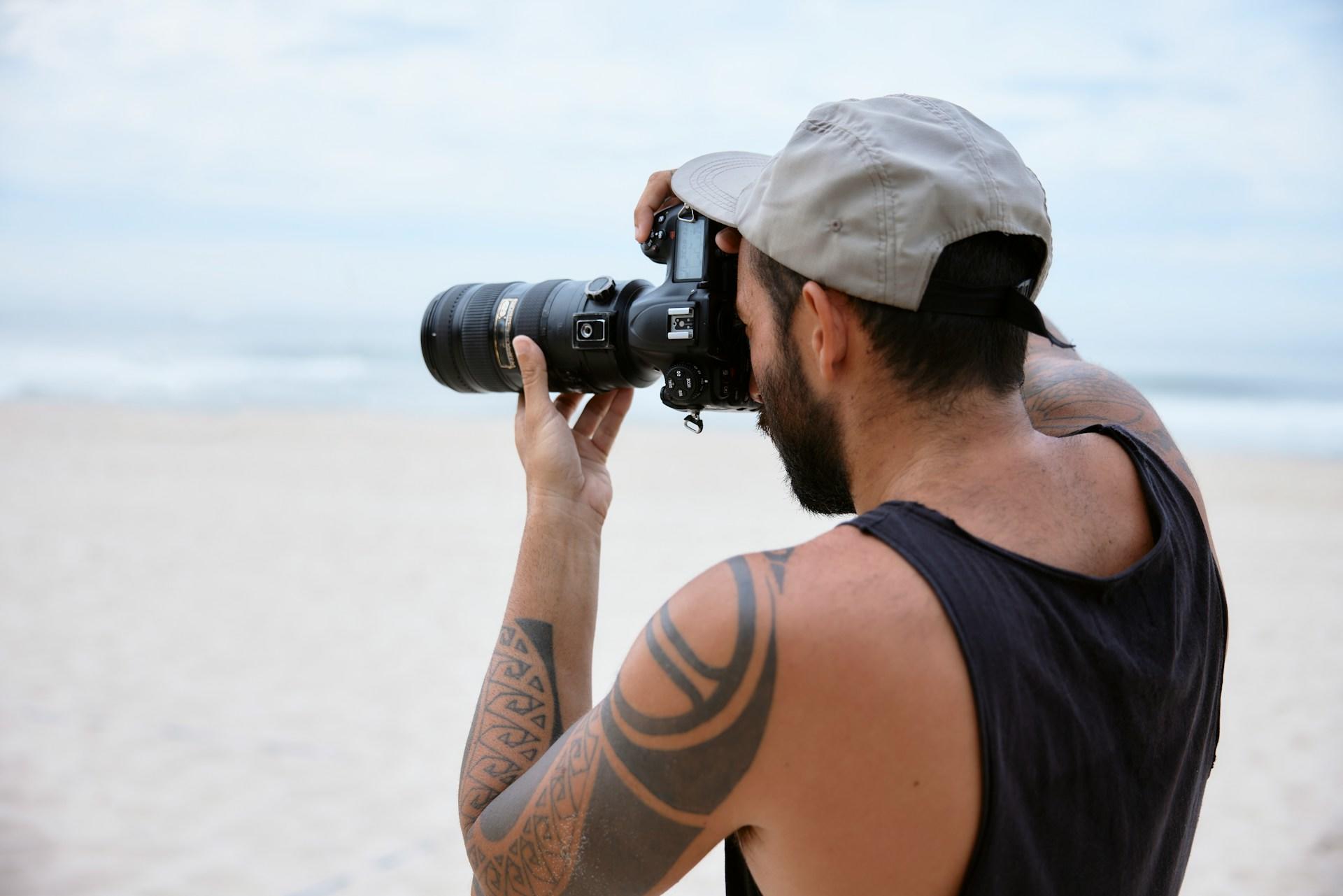 A photographer on the beach.