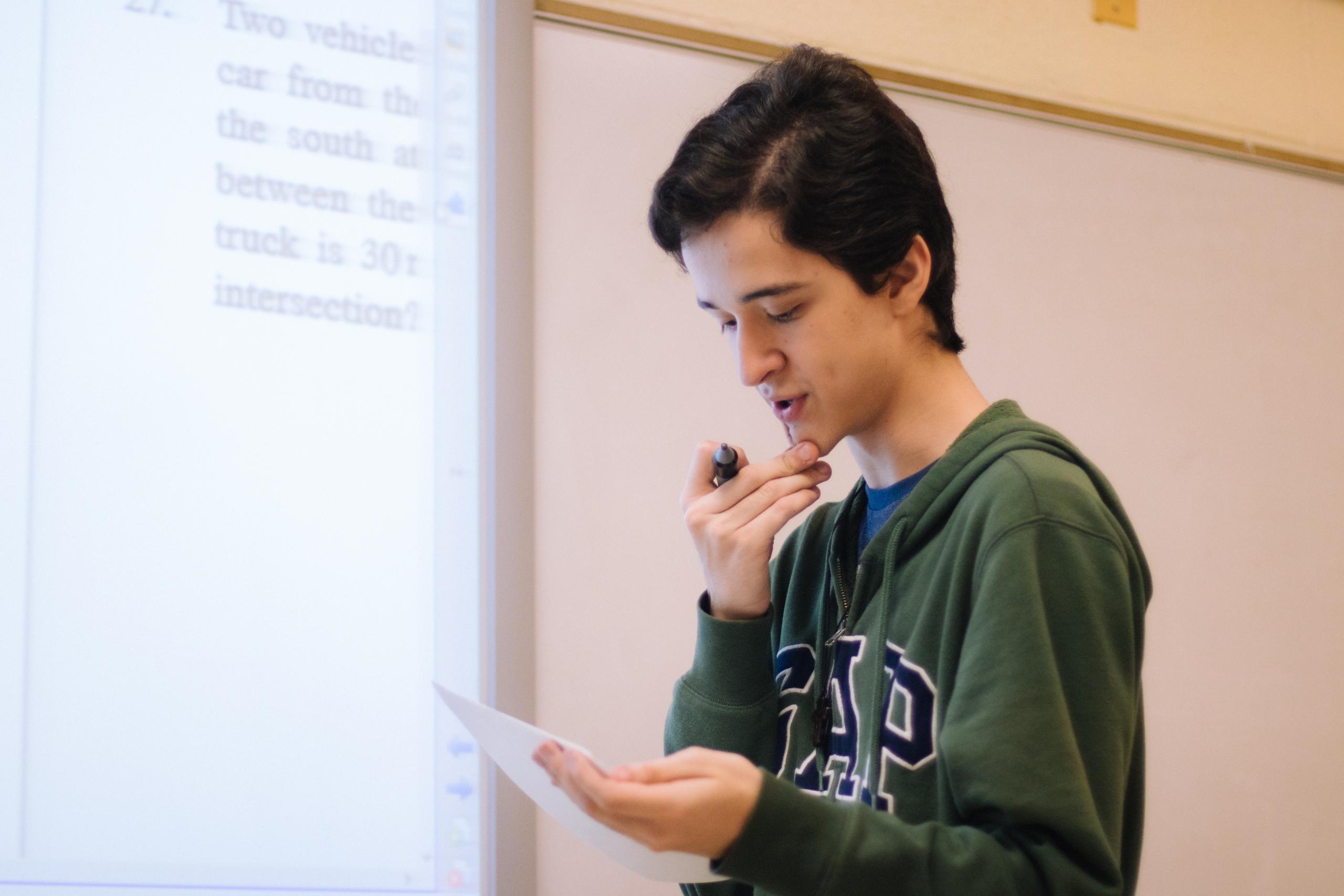 A math student works on their communication skills during a presentation