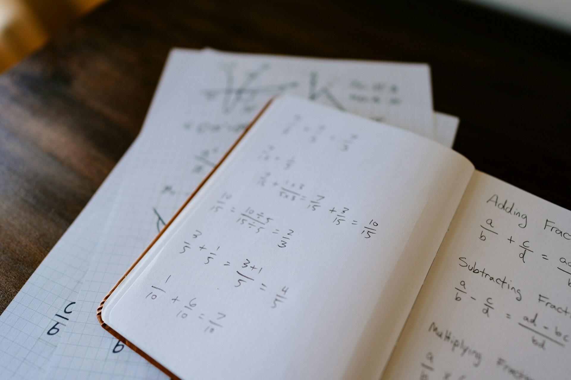 Math problems in a notebook.
