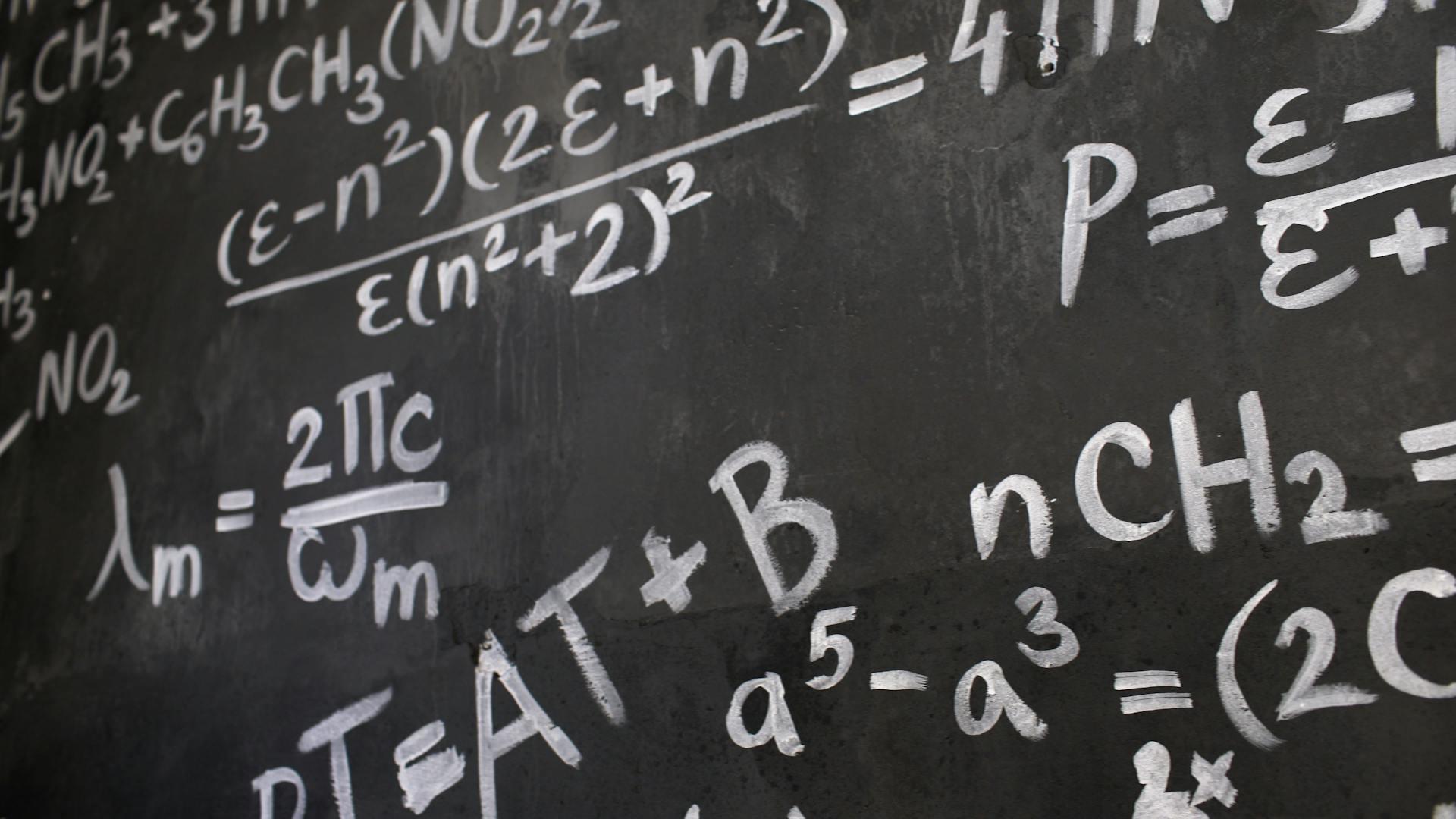 math equations on a chalkboard