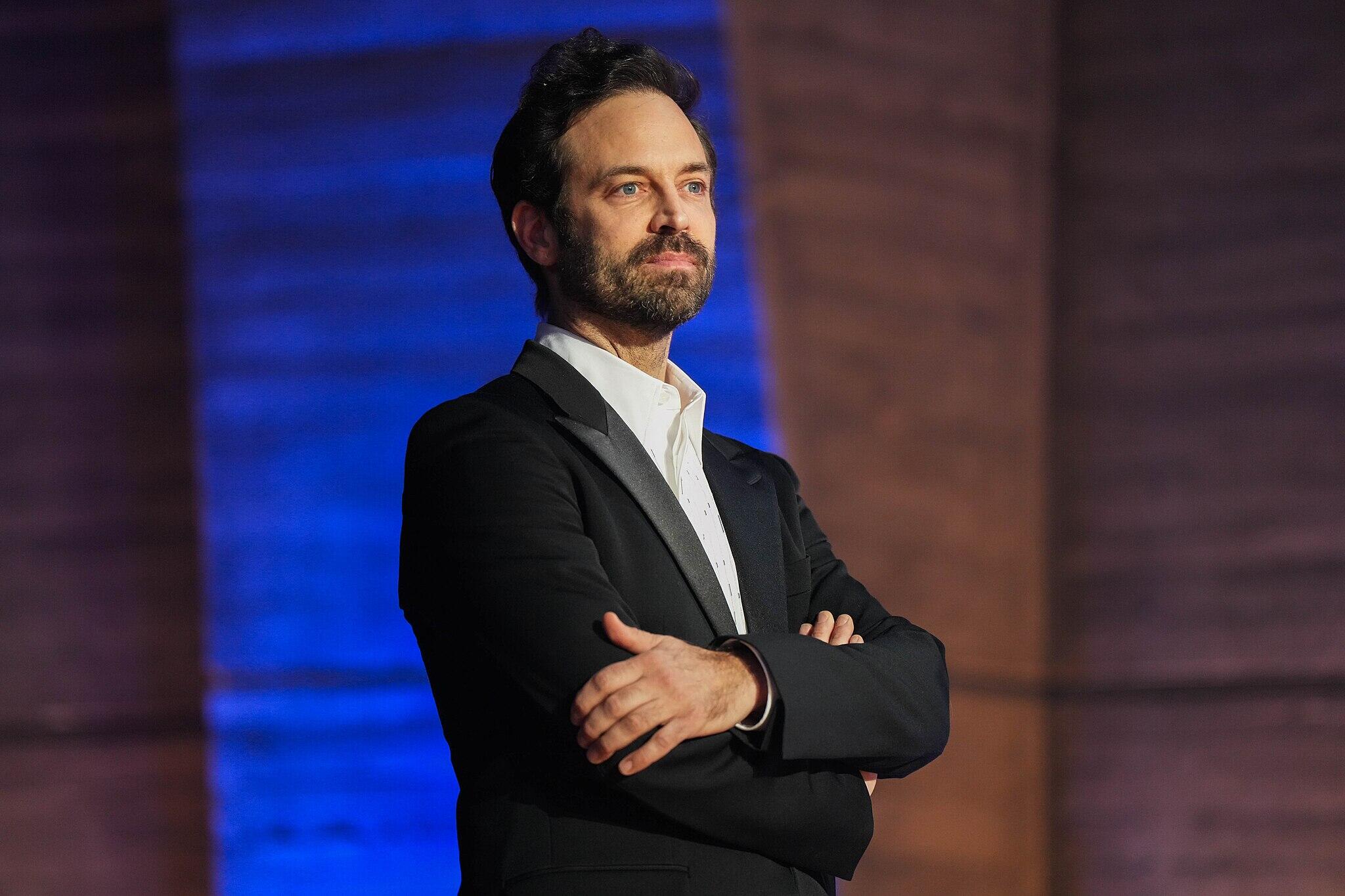 Benjamin Millepied standing with his arms crossed.