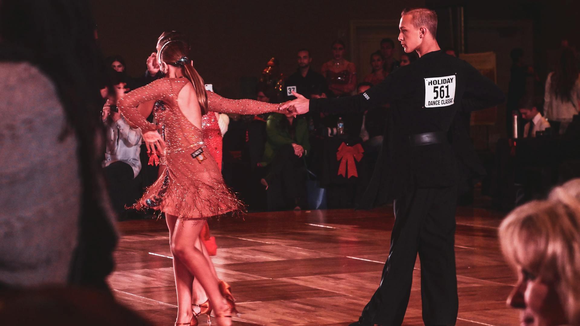 A couple dancing in a competition.