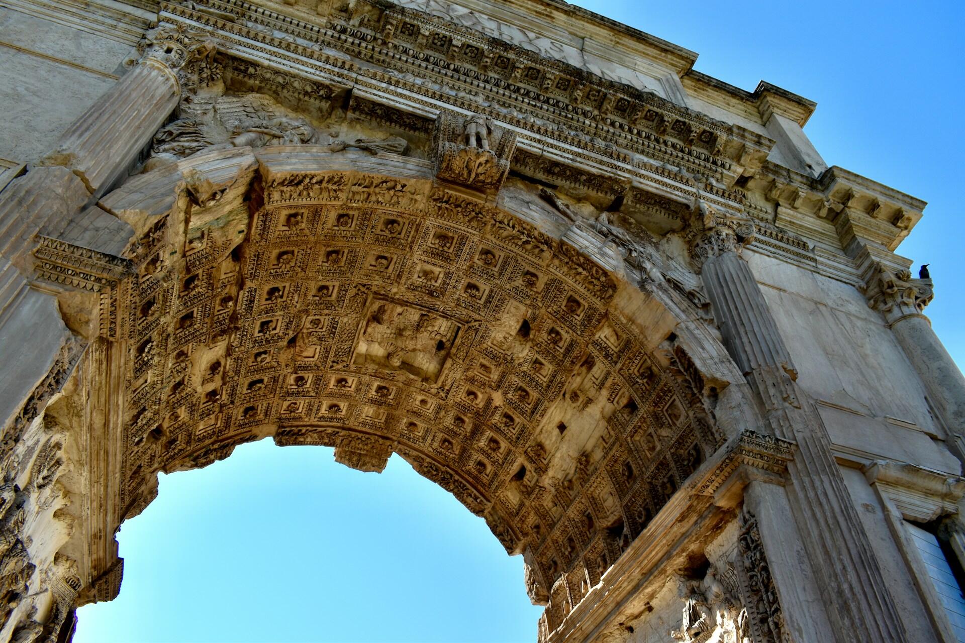Looking up at the Arch of Titus in Rome, Italy.