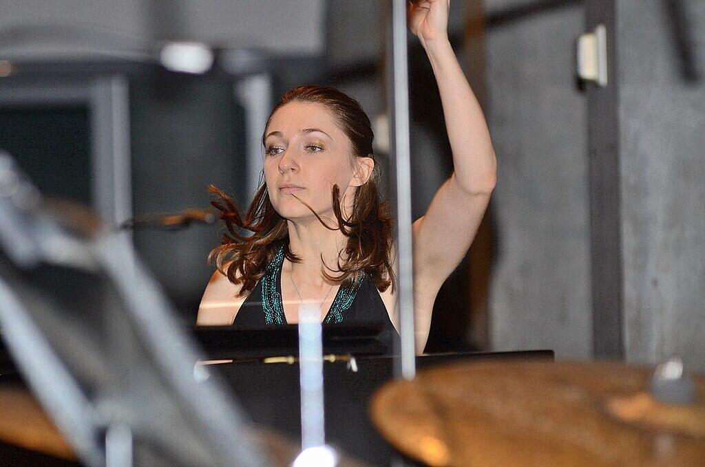 Sonya Belousova playing on the piano.