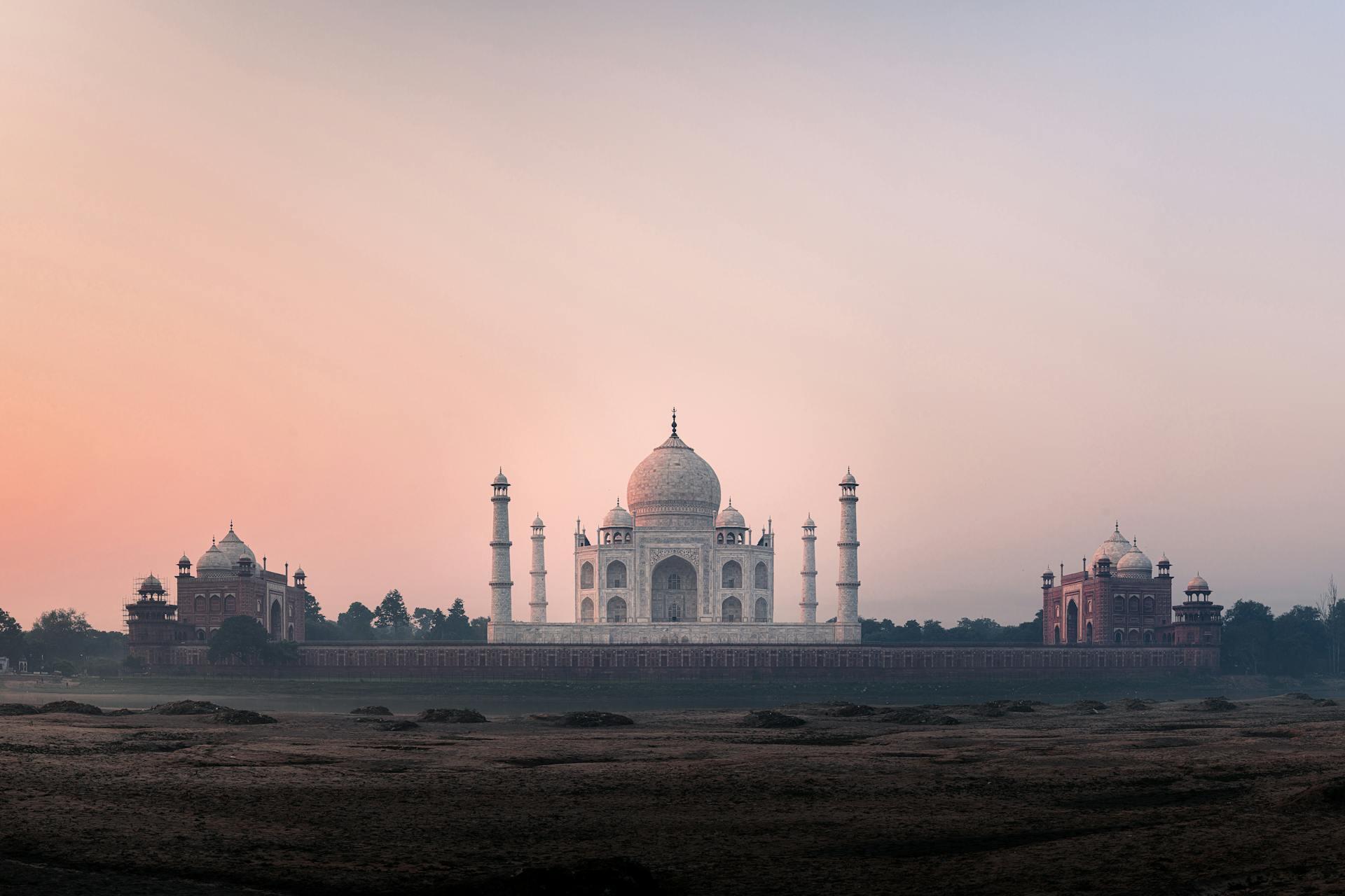 distance shot of the Taj Mahal at sunrise