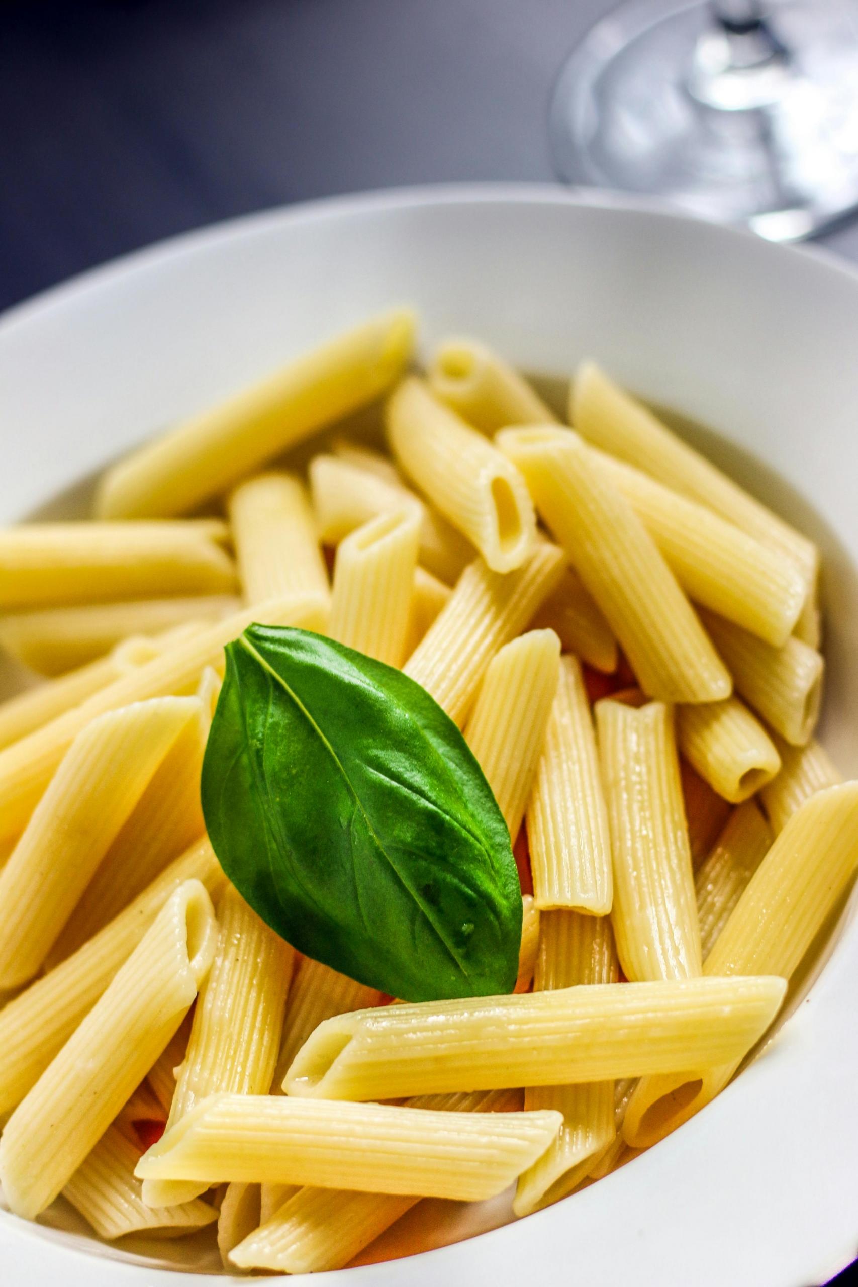 Pasta lying in a bowl, ready to be eaten as part of a nutritious meal