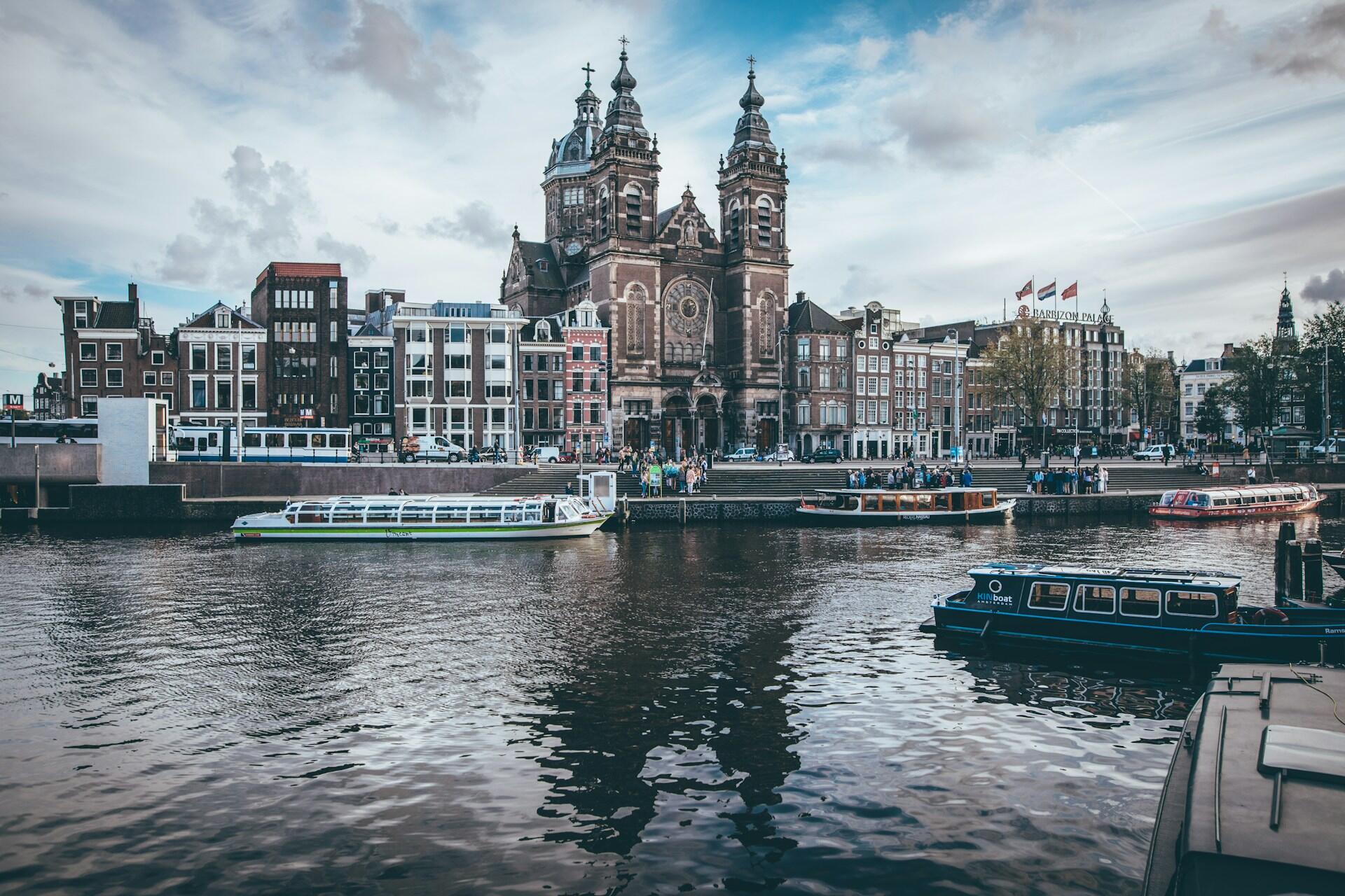 A beautiful building alongside a canal.