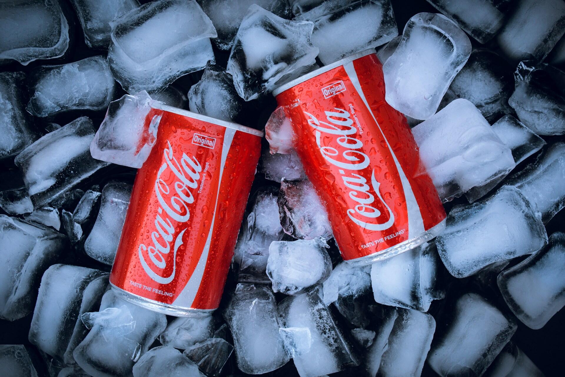 Coke cans on ice.
