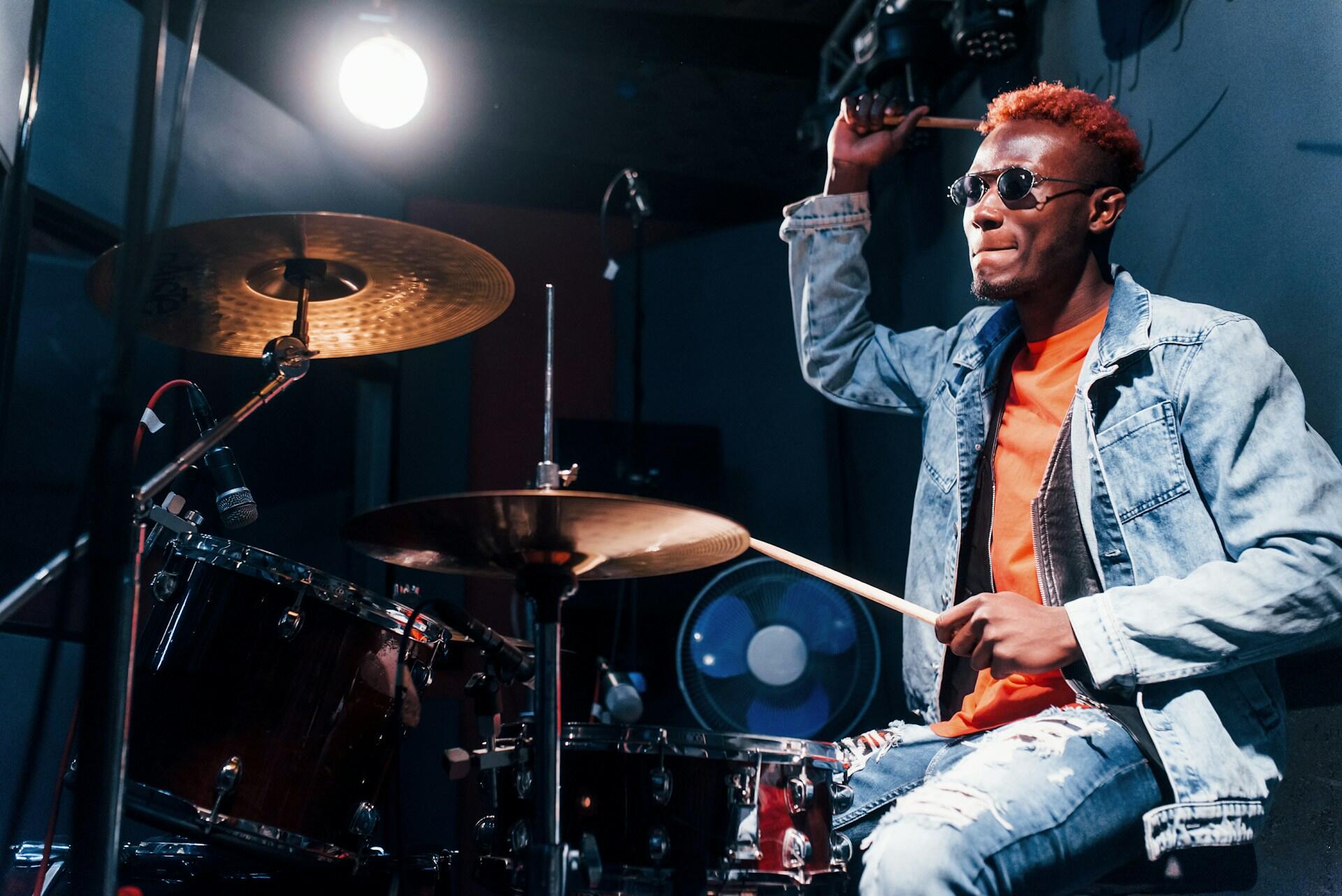 A drummer playing the drums.