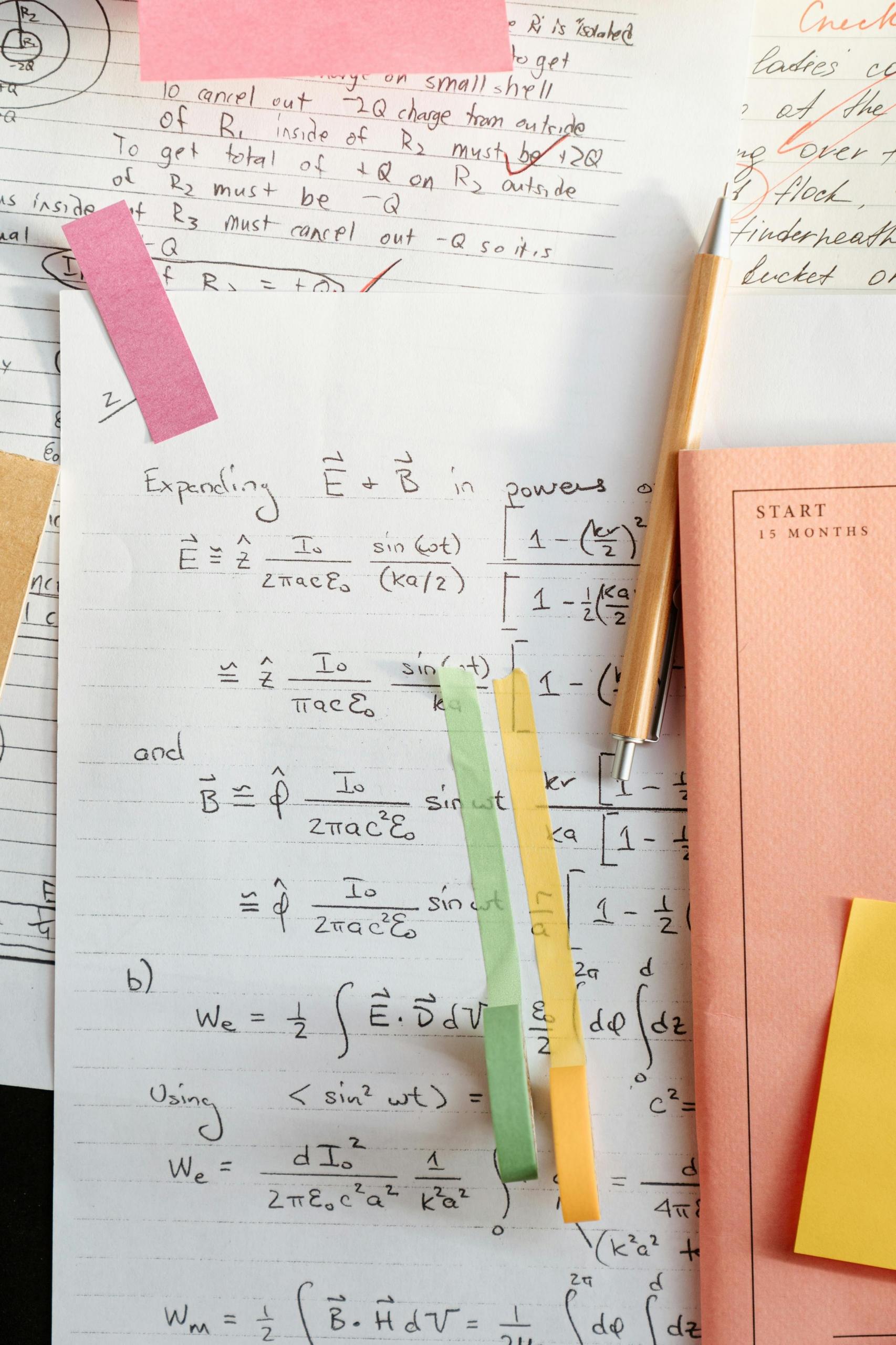 A notebook filled with physics notes