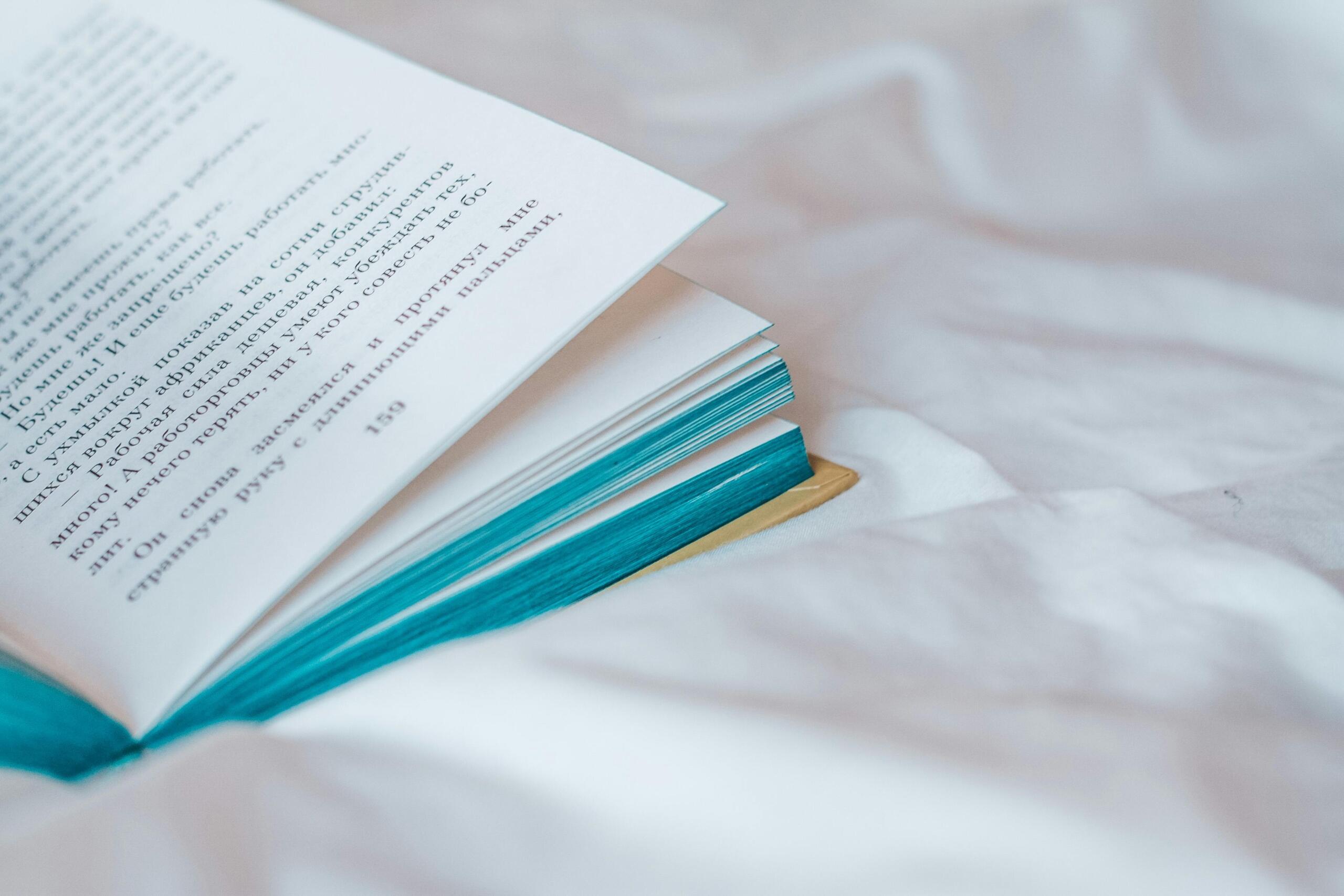 photo-of-a-book-on-white-textile