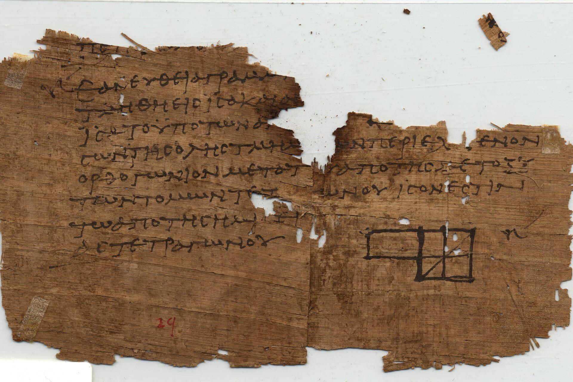 Ancient papyrus fragment with Greek writing and geometric diagram