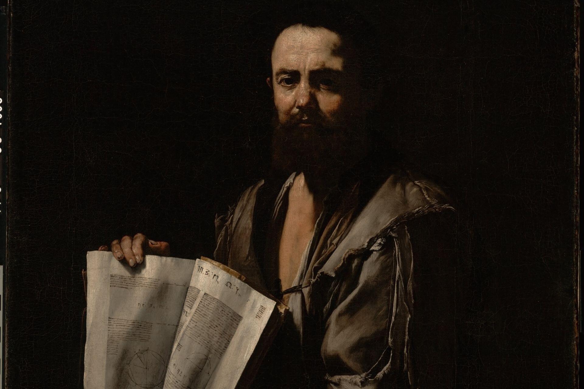 Painting of a bearded man holding an open book with geometric diagrams