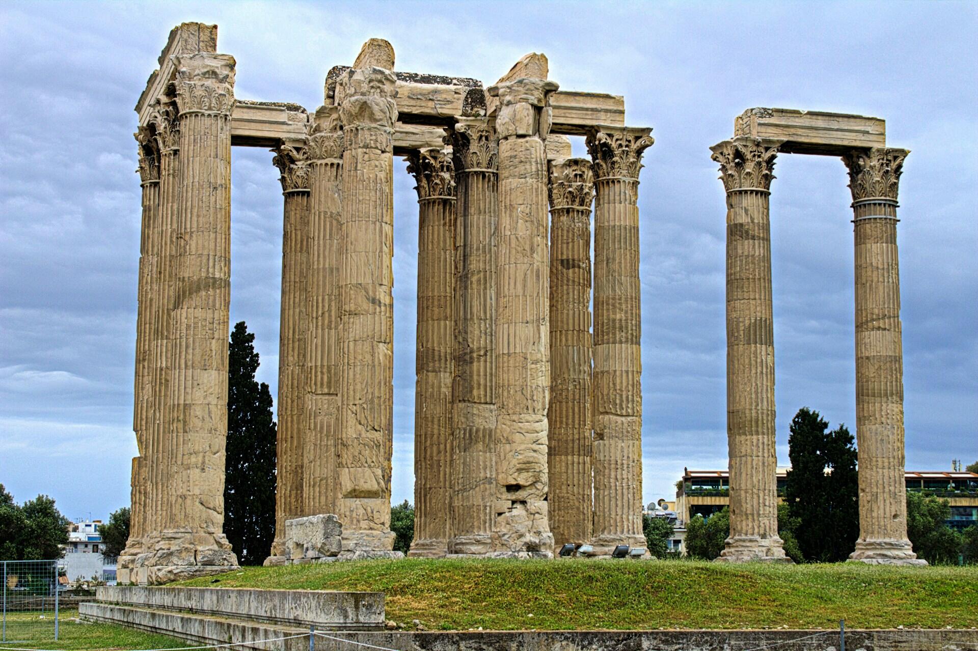Greek ruins pictured on a clear blue day.