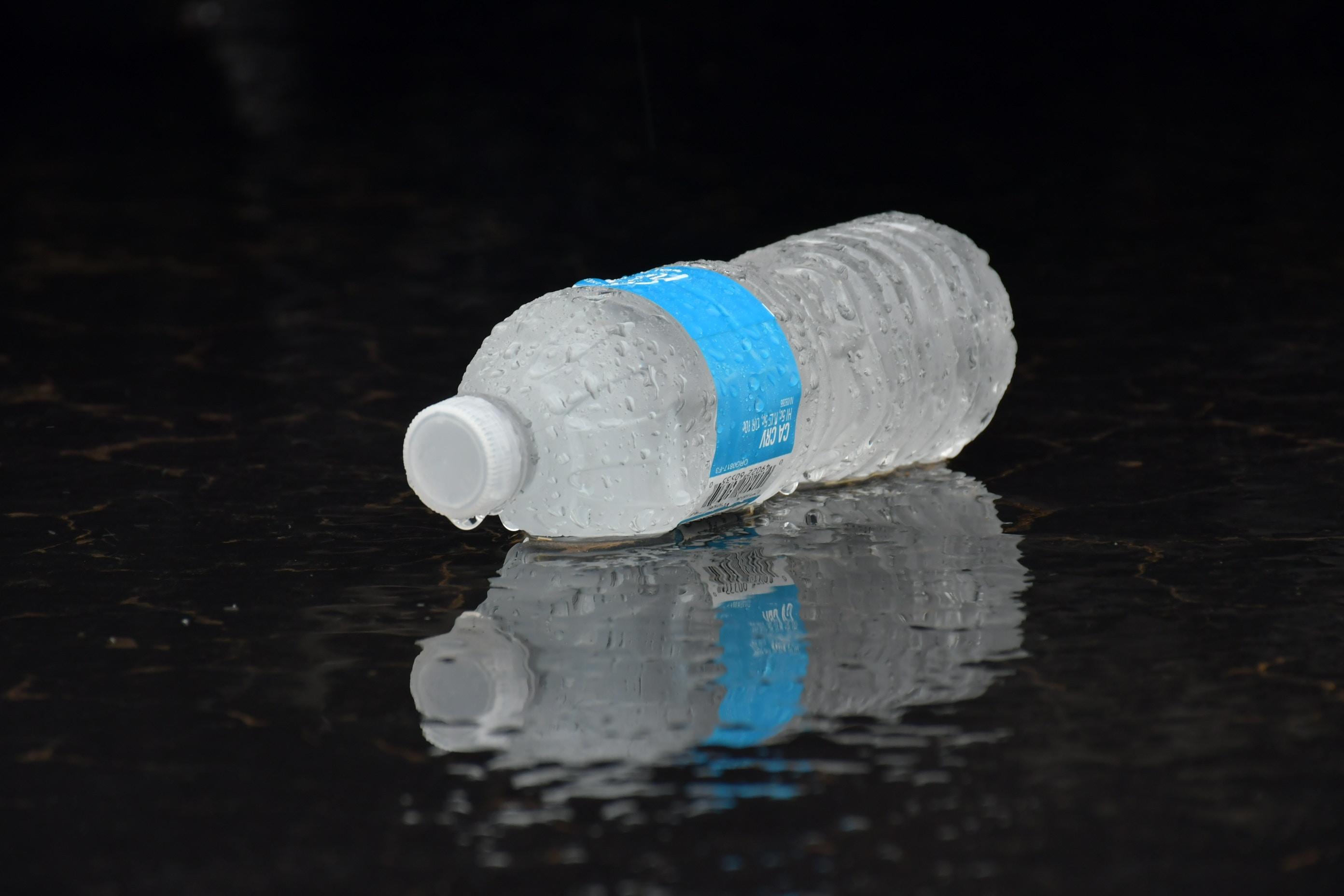 Water bottle in the ground