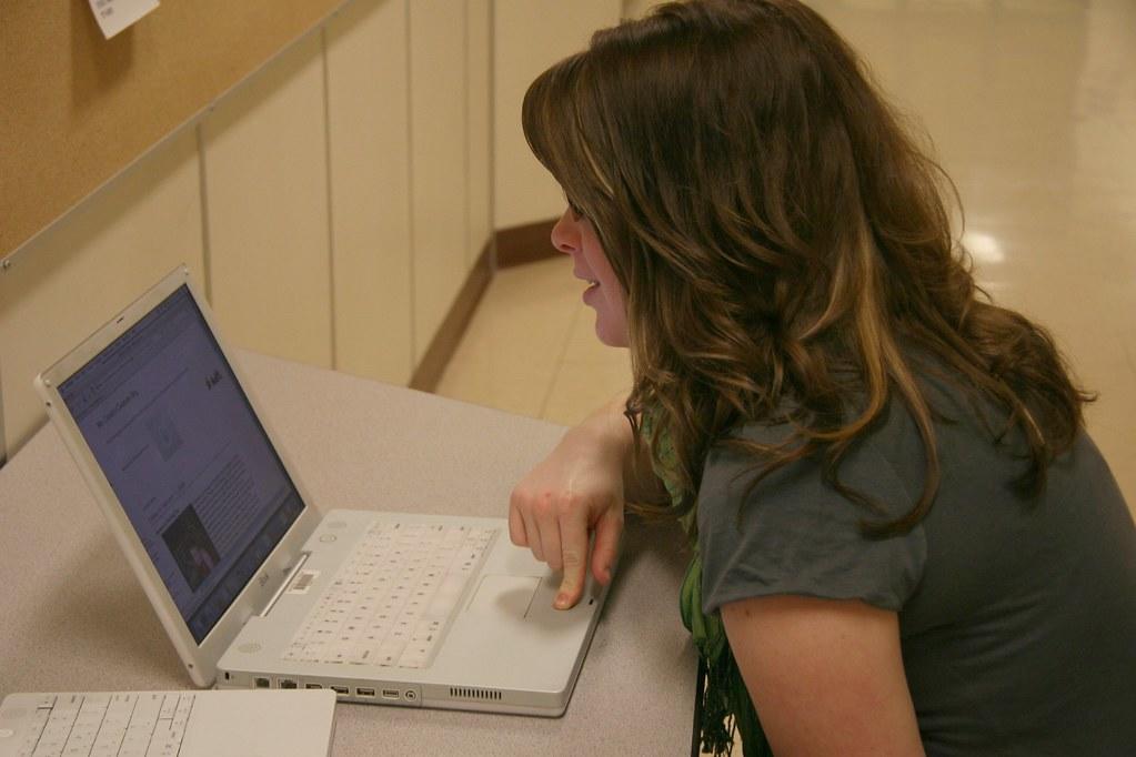 A student studies on her laptop.