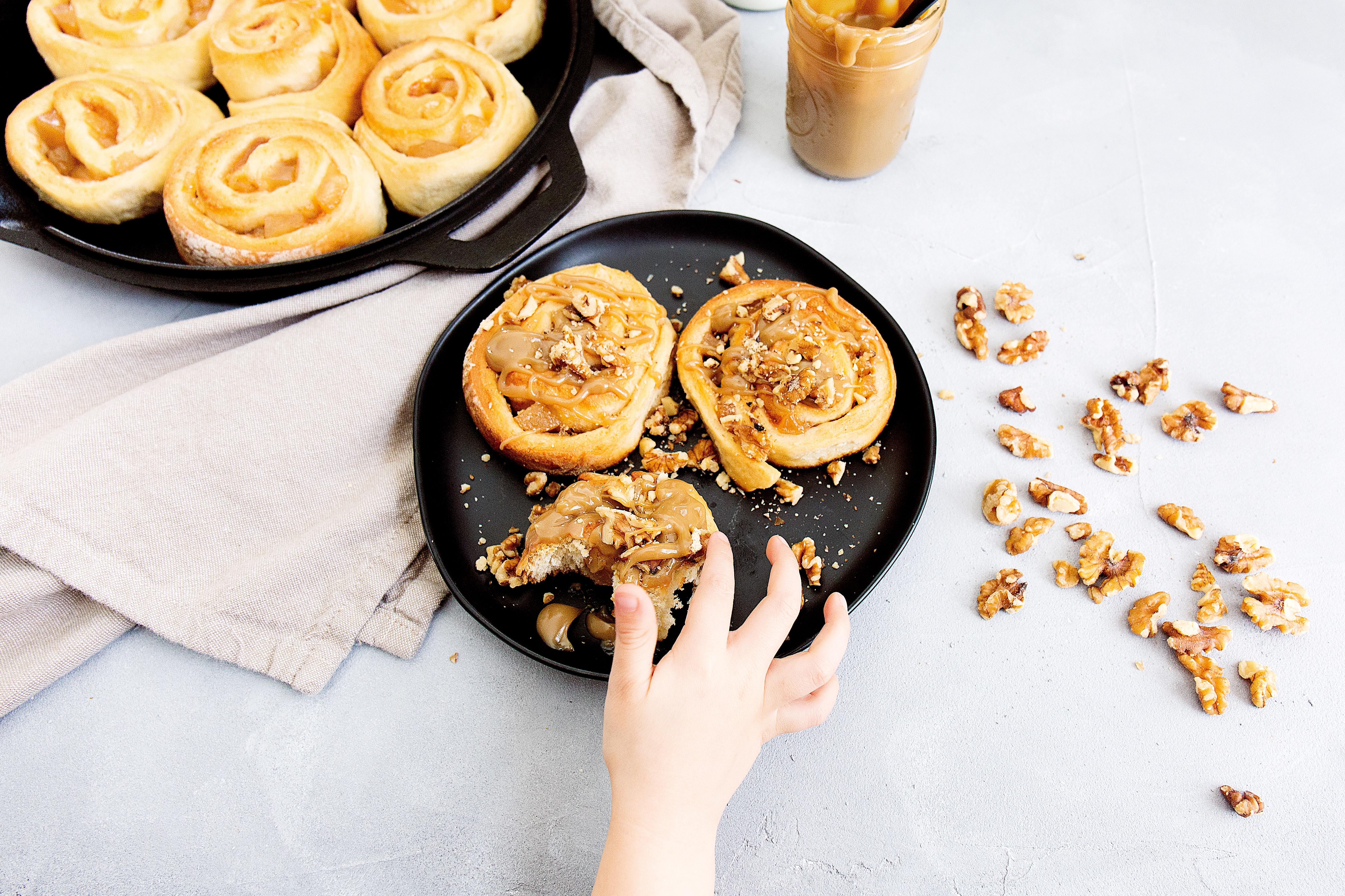 Cinnamon buns on a small plate.