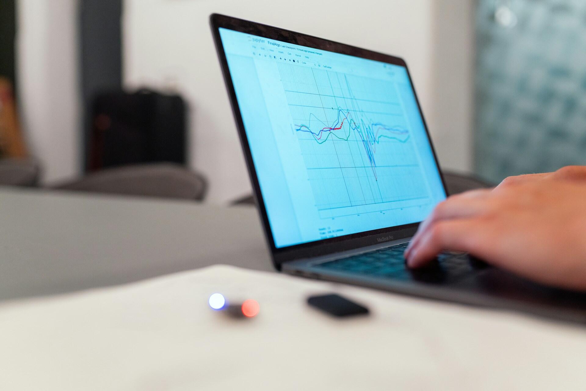 Someone using an IT software on a computer.