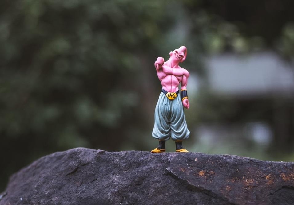 An action figure of Majin Buu (A Dragon Ball Z character) showing the sign of thumbs down