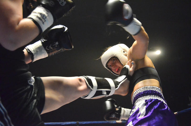 Two women kickboxing