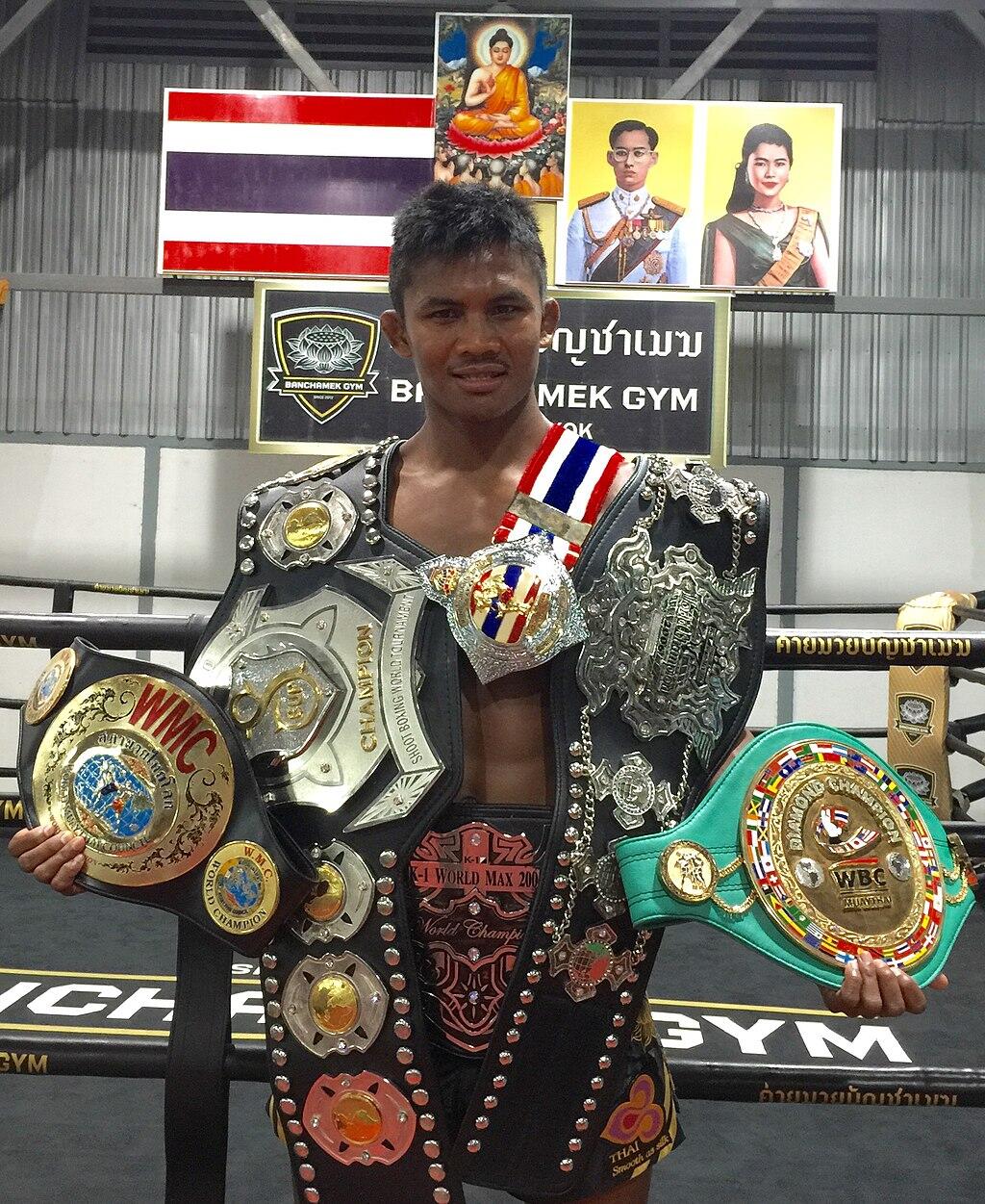 Buakaw Banchamek with all of his winning boxing belts.