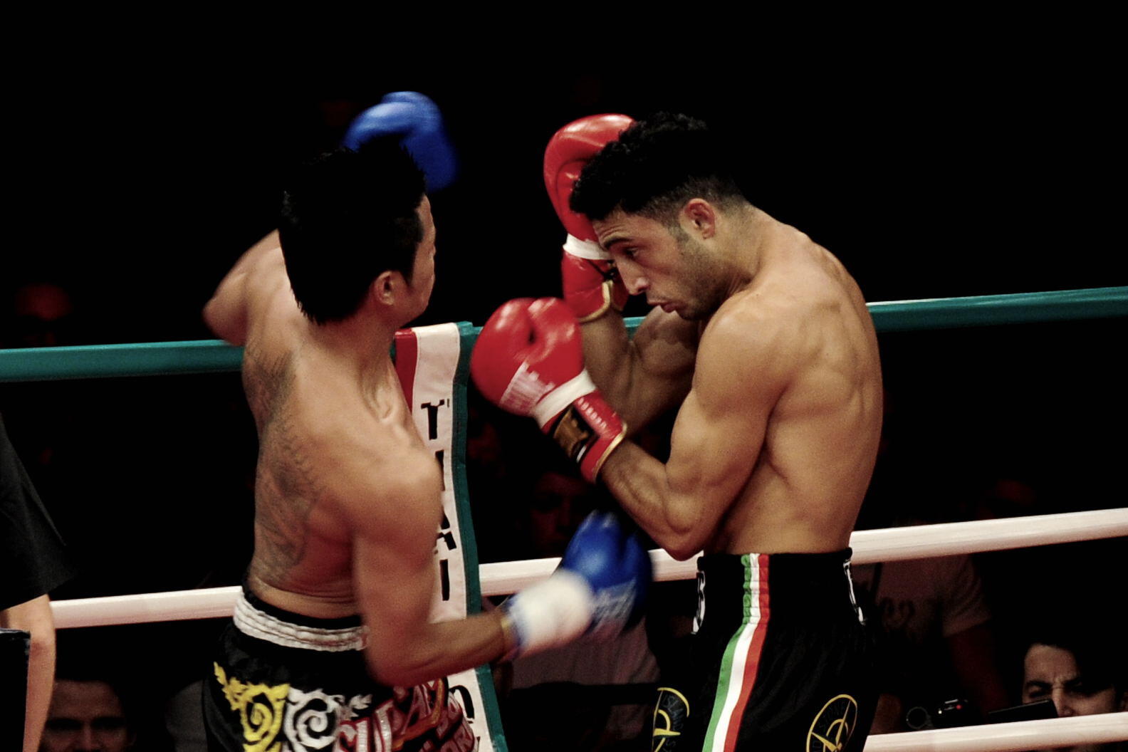 Giorgio Petrosyan fighting in the boxing ring.