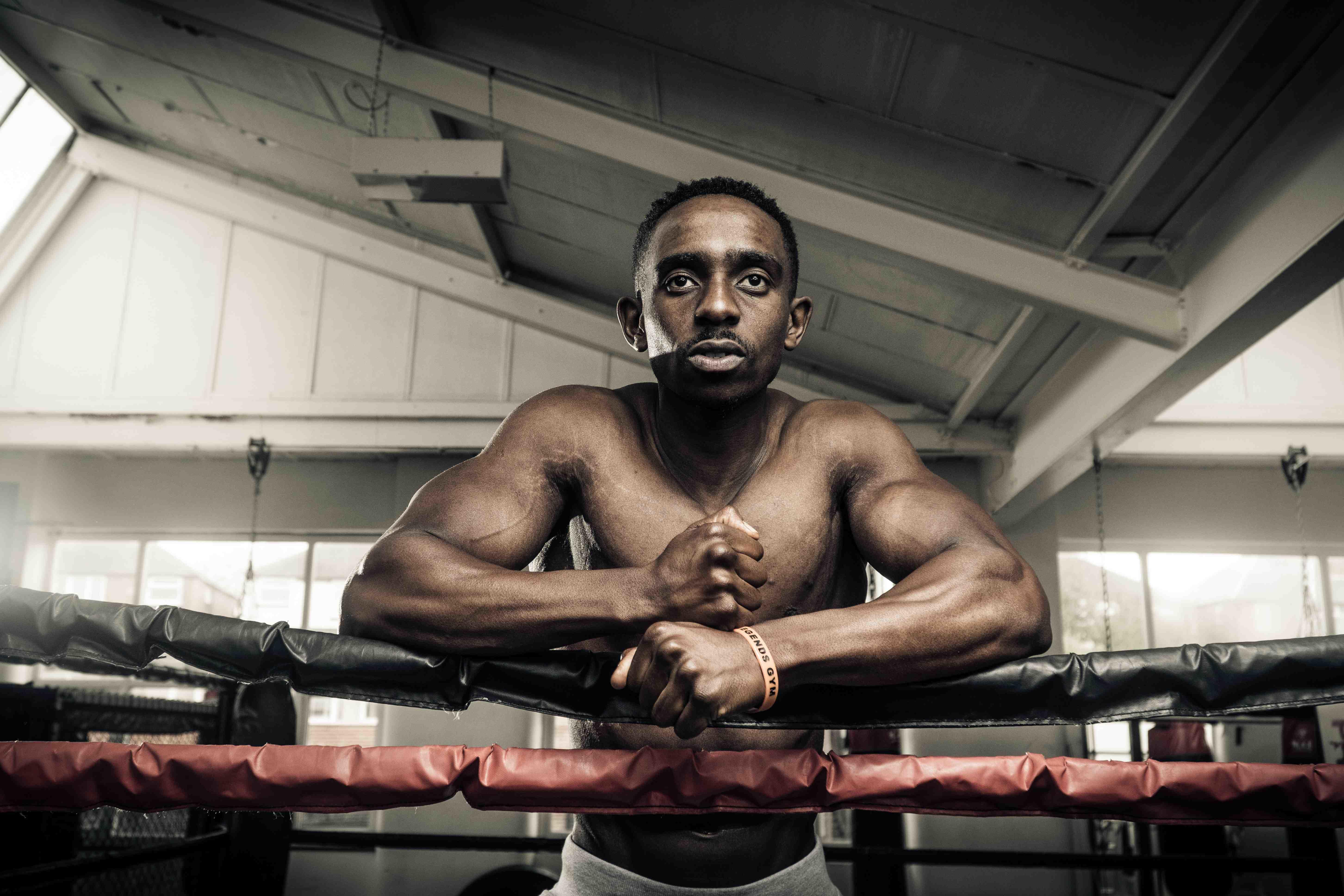 guy standing on a boxing ring ready to train