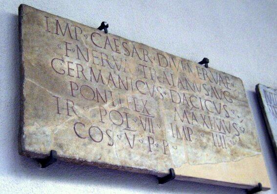 A sign with Latin inscription.