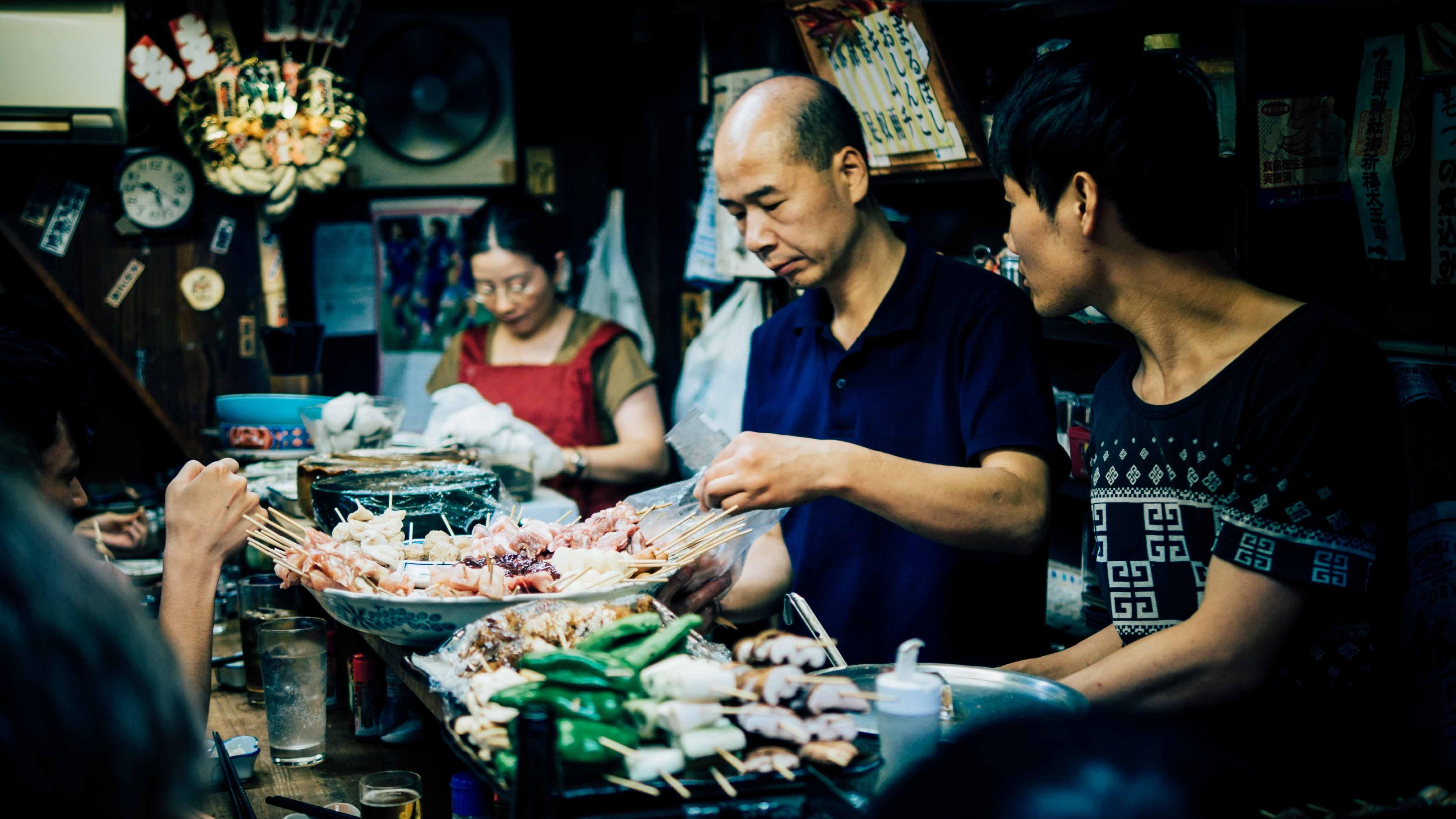 food being prepared by a group of people