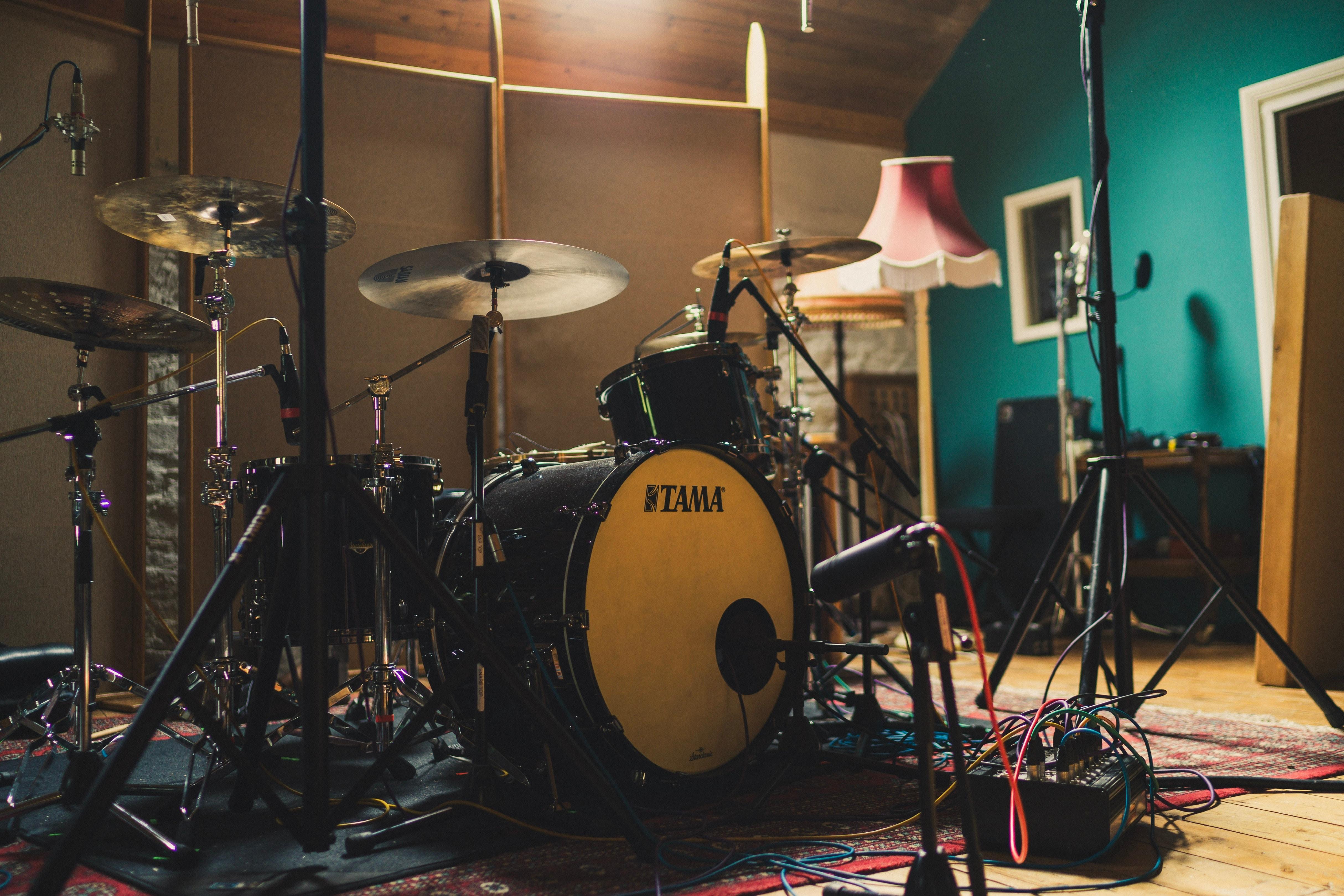 Entire drum set in a big room.