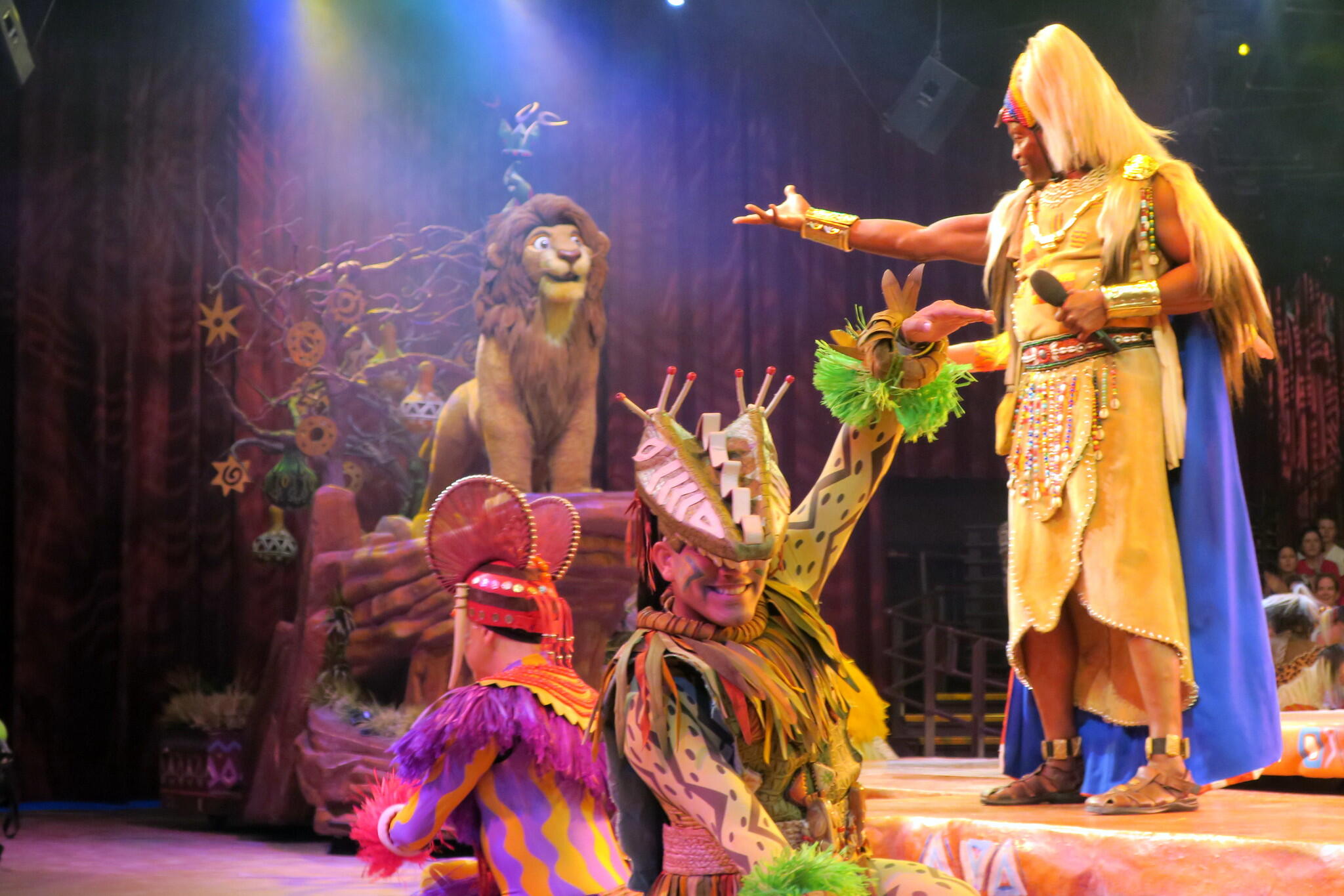 Actors performing the Lion King musical.