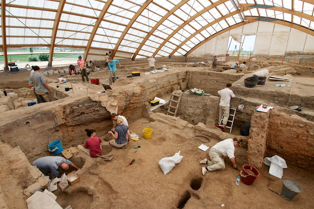 excavation site with a group of historians at work 