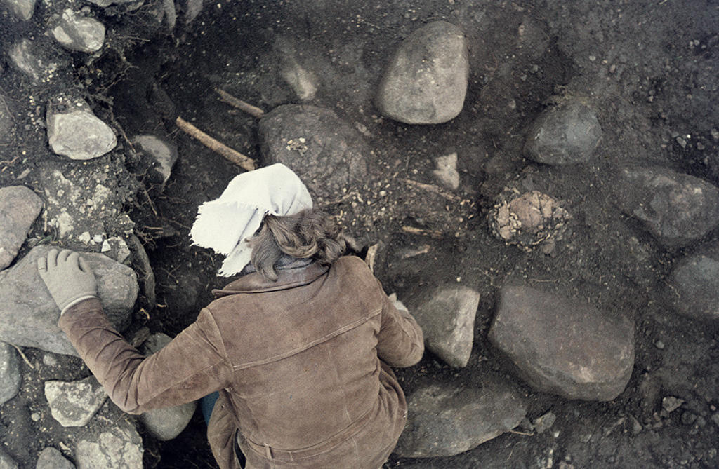 woman anthropologist excavating an ancient site