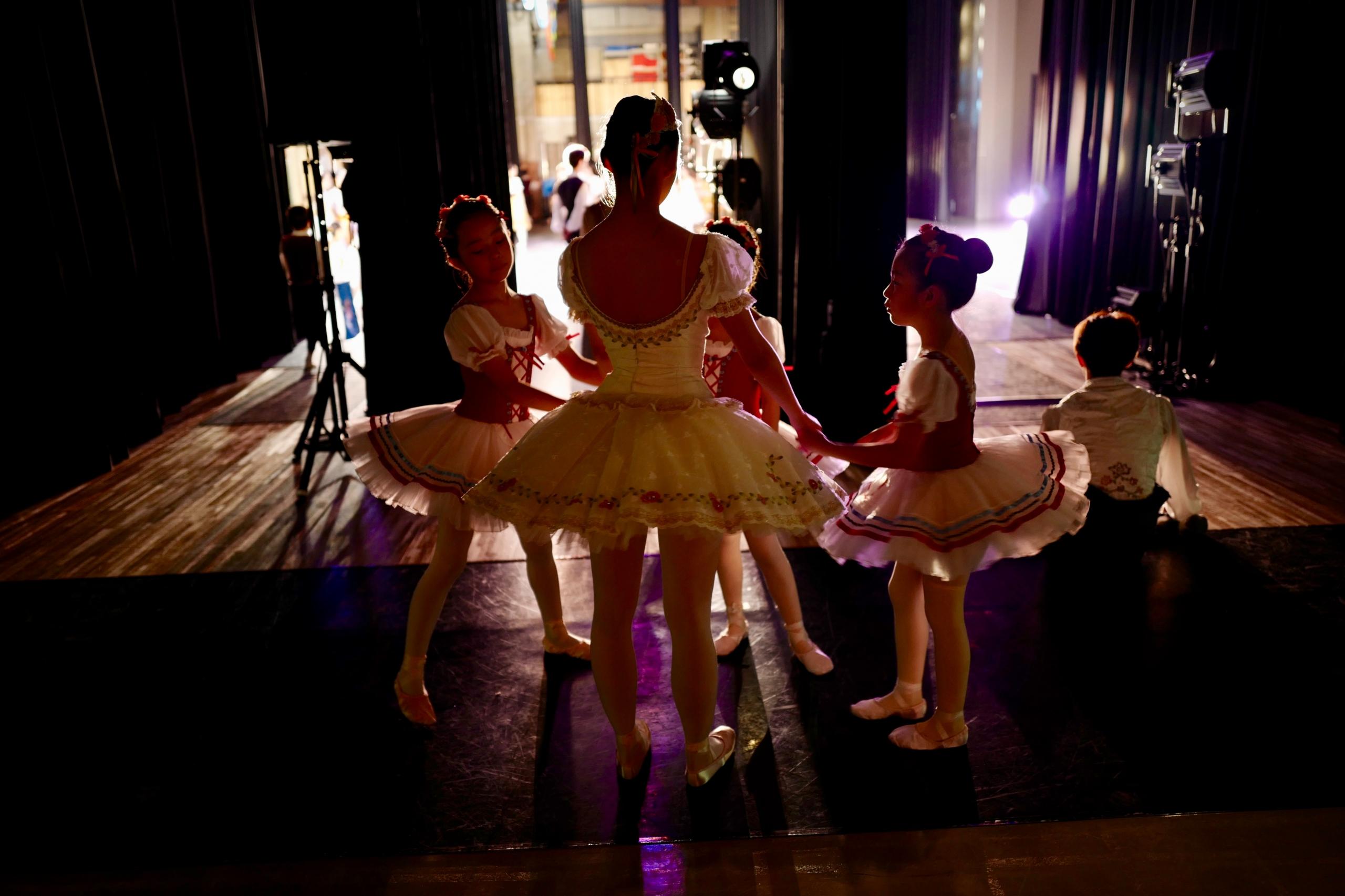 Children rehearsing their ballet performance with their teacher. Dancing is for everyone! But dancing for kids can be especially beneficial as they are in their developmental years and are most impressionable when they are children