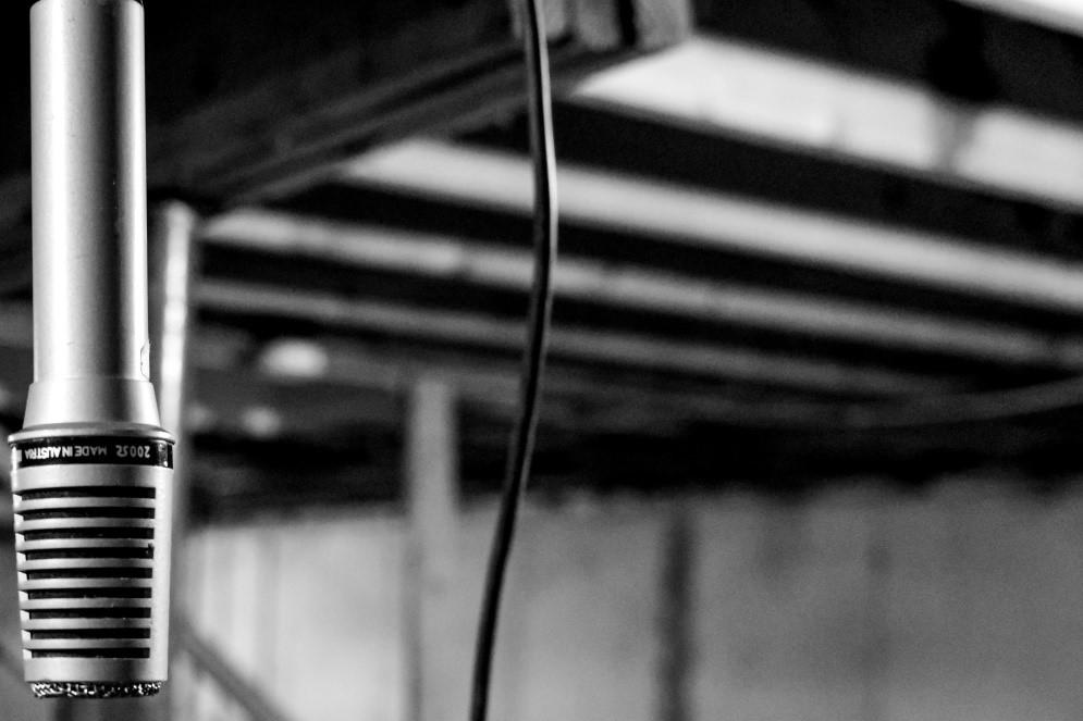 A grey-scale image of a hanging mic